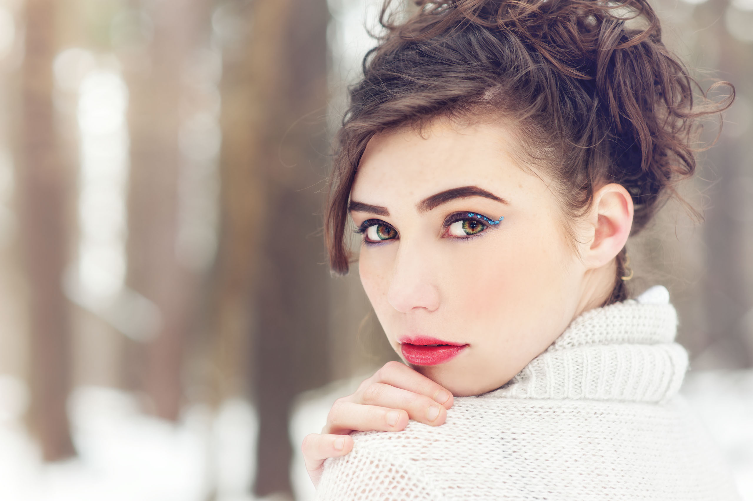A Senior photo of Anthony Wayne High School student, Kelsey, posing with an Elephant at the Toledo Lucas County Fair.